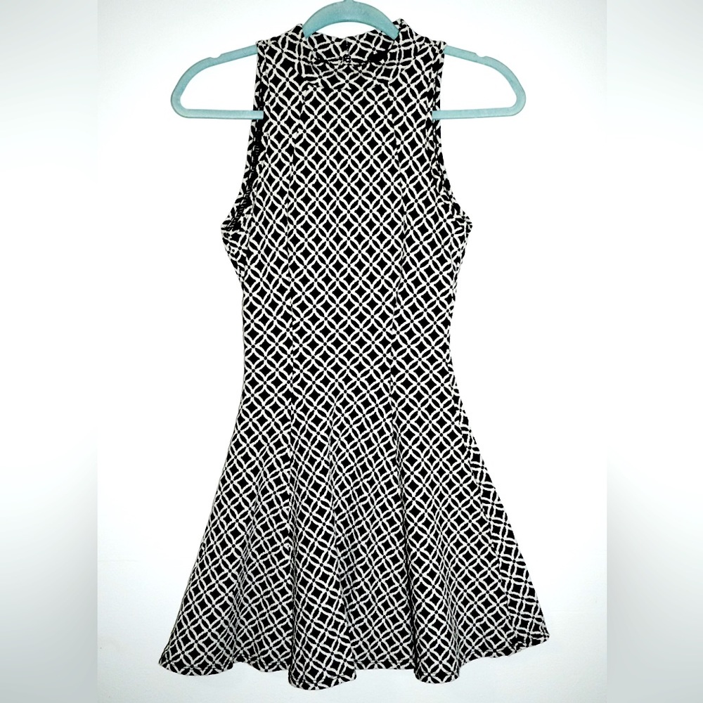 Black and white geometric sleeveless high neck above knee dress. Size S.